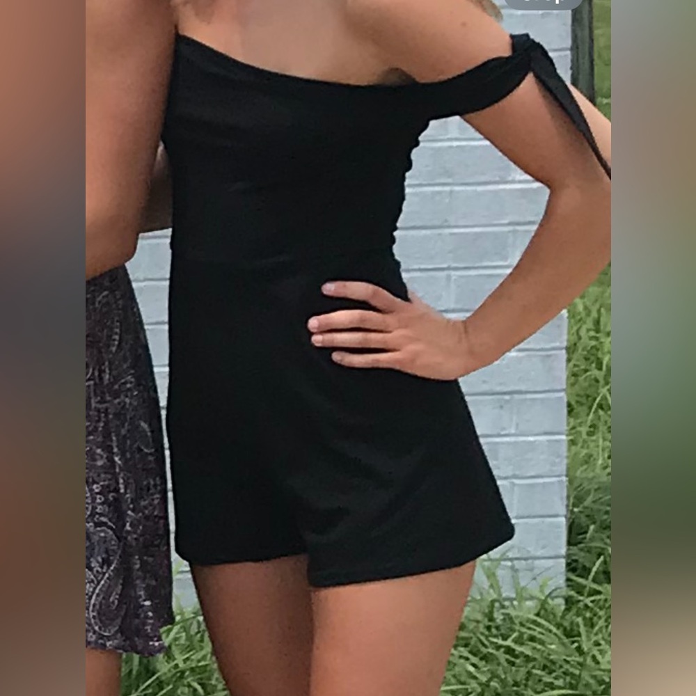 About us size small black romper from revolve